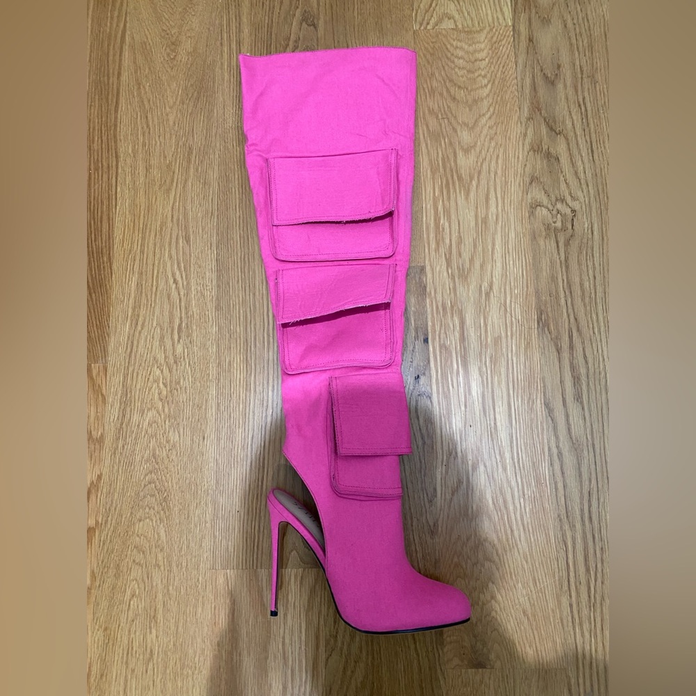 57th Ave Brand New Thigh High boot with pockets. The pink boots are a must have.